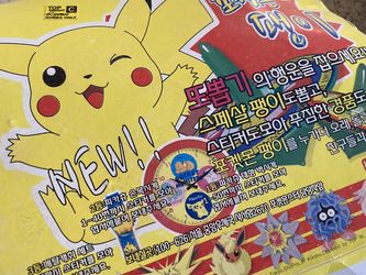 Vintage lot of Pokémon toys some cards and spinners tops and TMNT Turtles misc