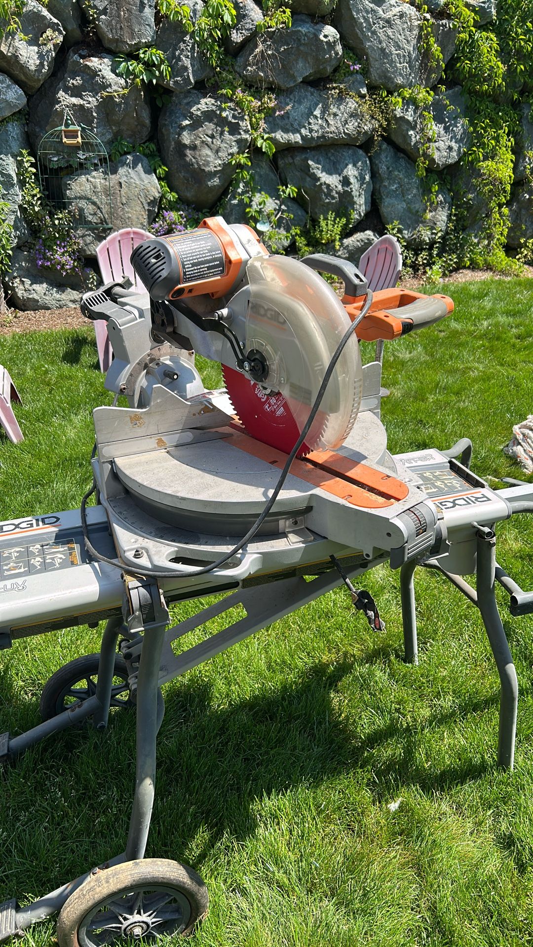 Sliding compound miter saw with table
