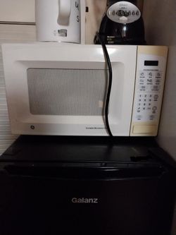 Used Small GE Countertop Microwave Oven - Works Great!