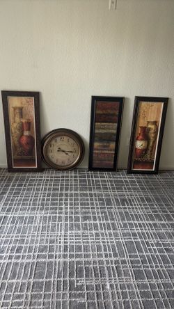 Rug and vase picture frames in a clock all comes together