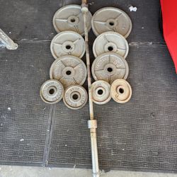 Olympic weights 270lbs total plus 7ft 45lbs bar