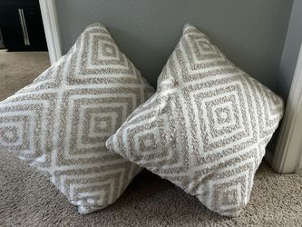 2 brand new tan pillows