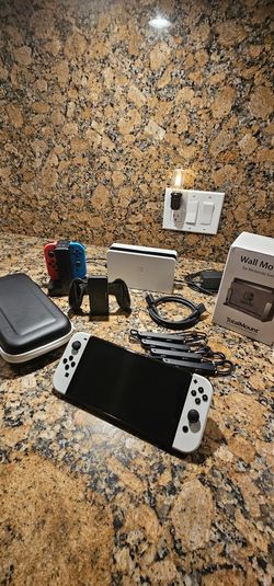 Nintendo Switch Oled + ACCESSORIES