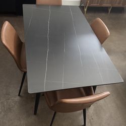 Dining Table And Four Chairs And Rarely To Use  It. Very Good Condition. 