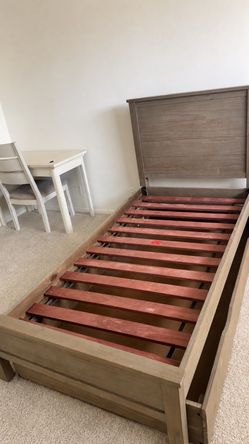 Twin bed with bottom drawer