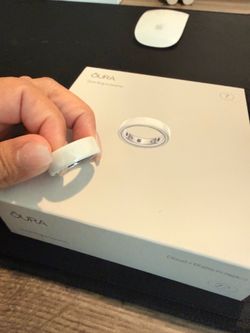 Oura ring.  Ceramic pearl white size 7