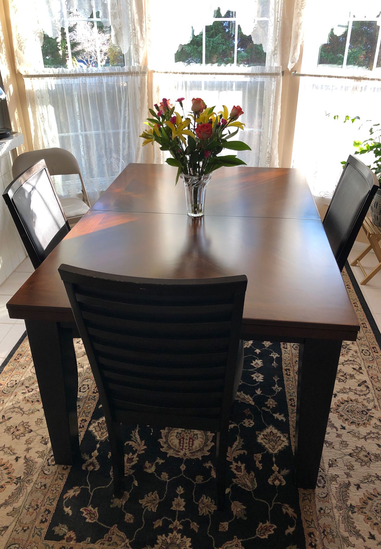 Solid Wood Breakfast Table with 18" Self storing extension leaf in very good condition (Free  Chairs - Qty 2)
