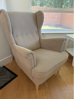 IKEA beige wing chair STRANDMON