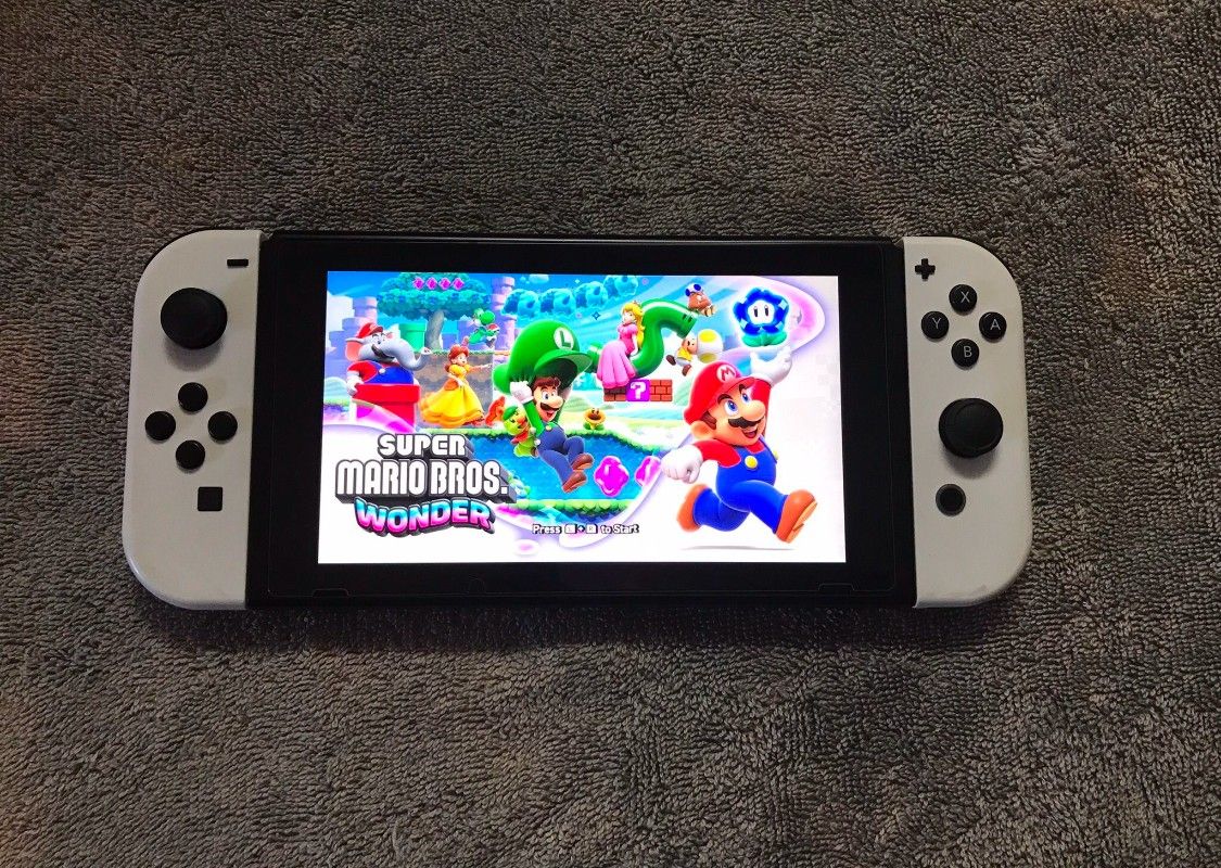 Switch V2 Complete With 100 Popular Games