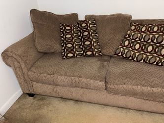 Brown sofa with cushions