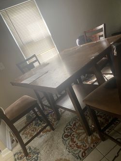 Hard wooden high top table and 4 Chairs