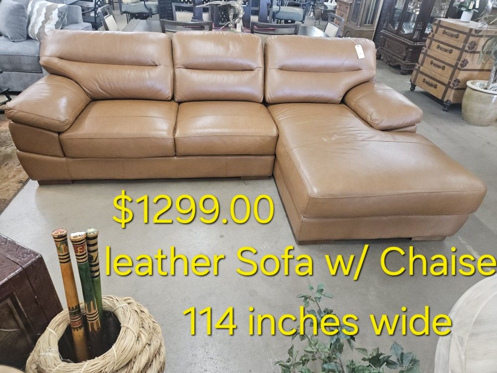 Sofa W/ Chaise Leather We are located at 2811 East Bell road. Another Time Around Furniture.