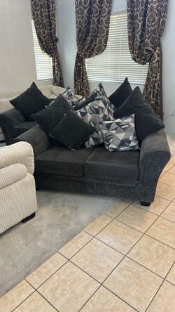 2 couches with pillows