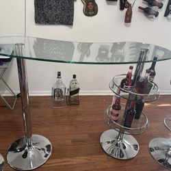 Glass Bar With Black Stools