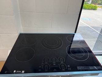 GE Profile 30” 5 burner electric cooktop in stainless steel