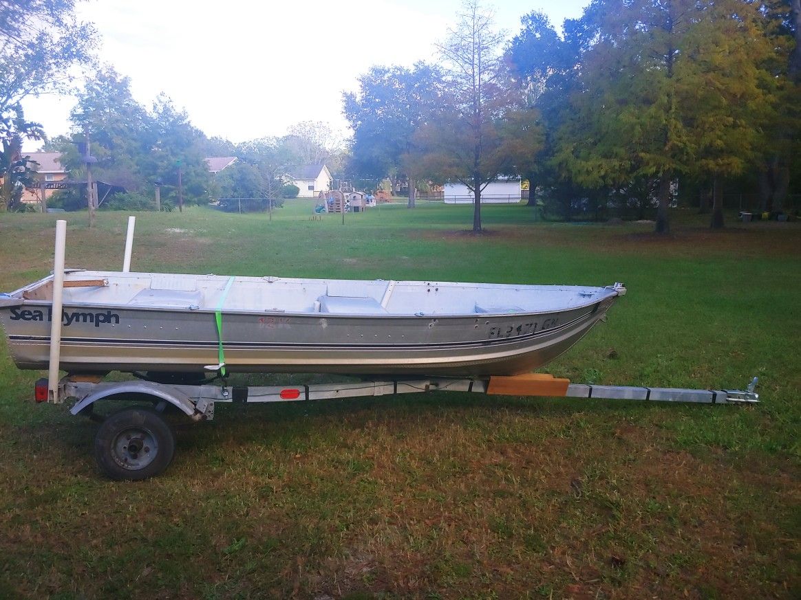 Sale Pending..... 12' aluminum boat with a galvanized trailer. Handy man special. 250.00