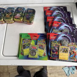 Pokémon card tins and packs