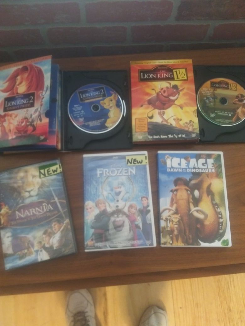 6 like new DVDs Frozen in package new, Narnia , new in package, all other movies excellent, all for $15