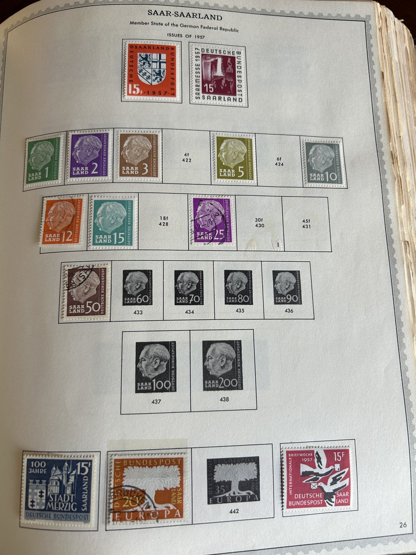 Saarland postage stamp lot of 14 mostly unused mint condition with hinge stamps issued 1957