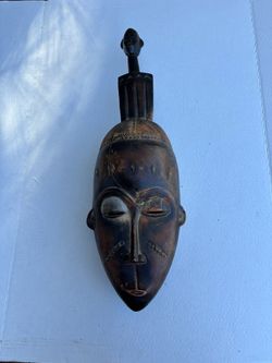 vintage West African Baule Mblo tribal mask from the Ivory Coast.