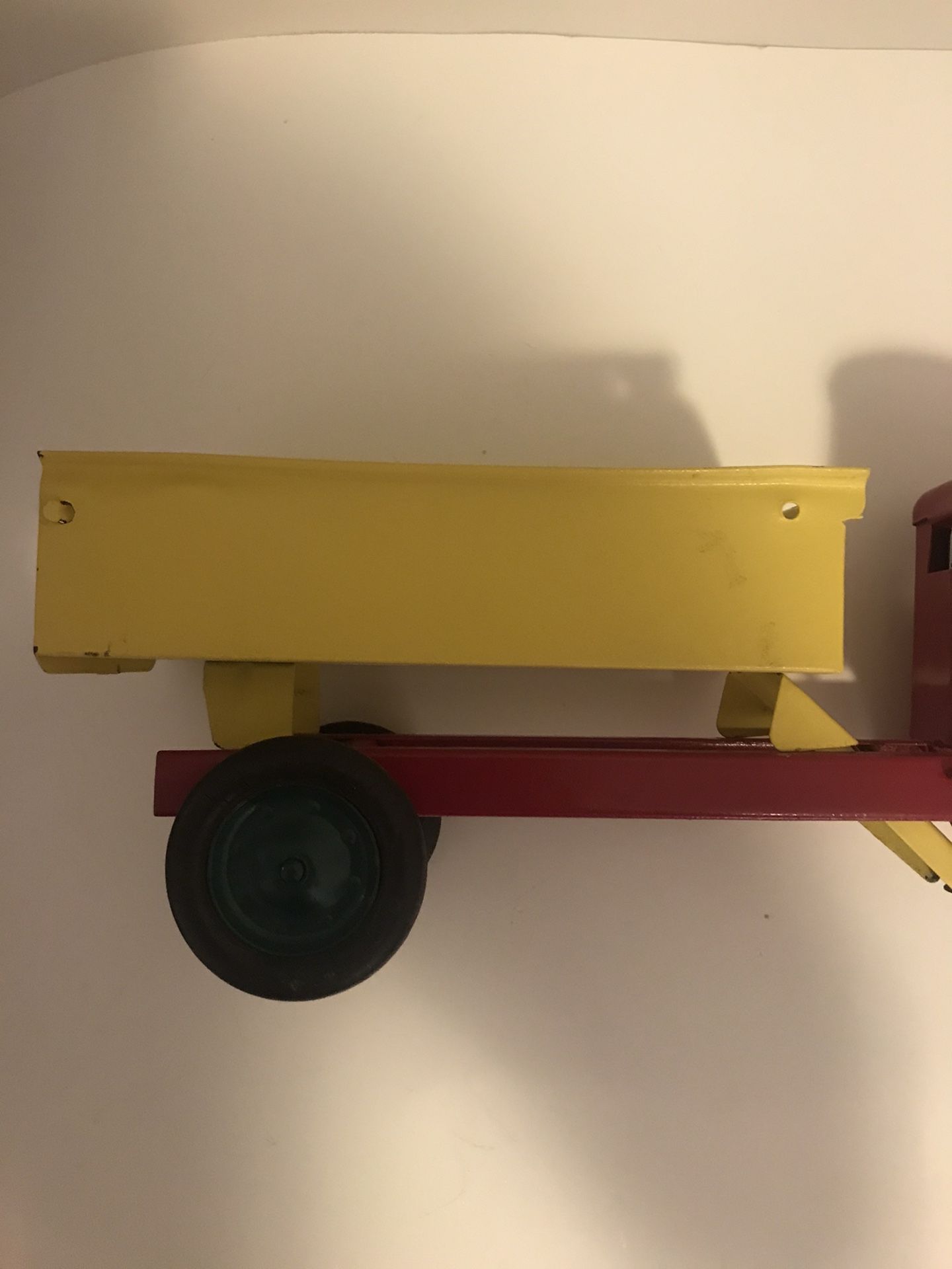 Vintage and Rare Turner Toys Pressed Metal Red and Yellow Dump Truck with Battery Slot for Working Headlights 18in Length 6in Height Normal Wear Rubb