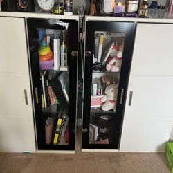 Two White and Black Bookshelves