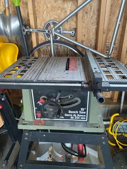 Portable table saw with roller extensions