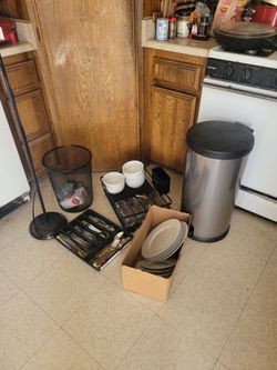 Amazon plates and bowls quality silverware. Trash can waste then floor lamp and moppen bucket.