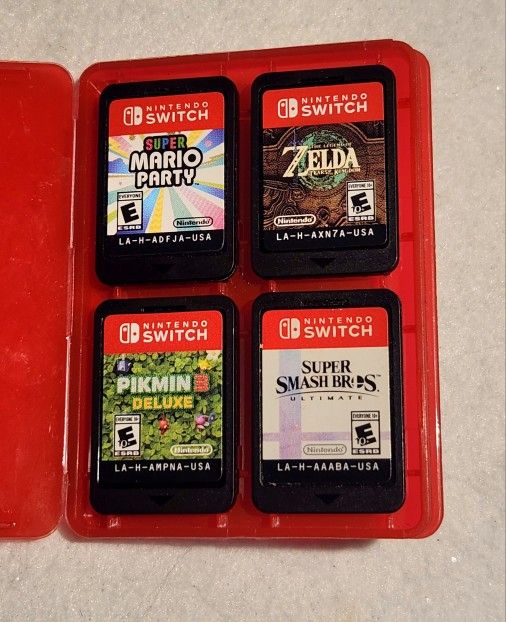 Nintendo Switch 4 Piece Lot cartridges only with case Zelda, Pikmin 3 Super Smash bros and Super Mario Party