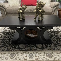 Two tables for your living room.  They are made of wood, like new.  with decorations included