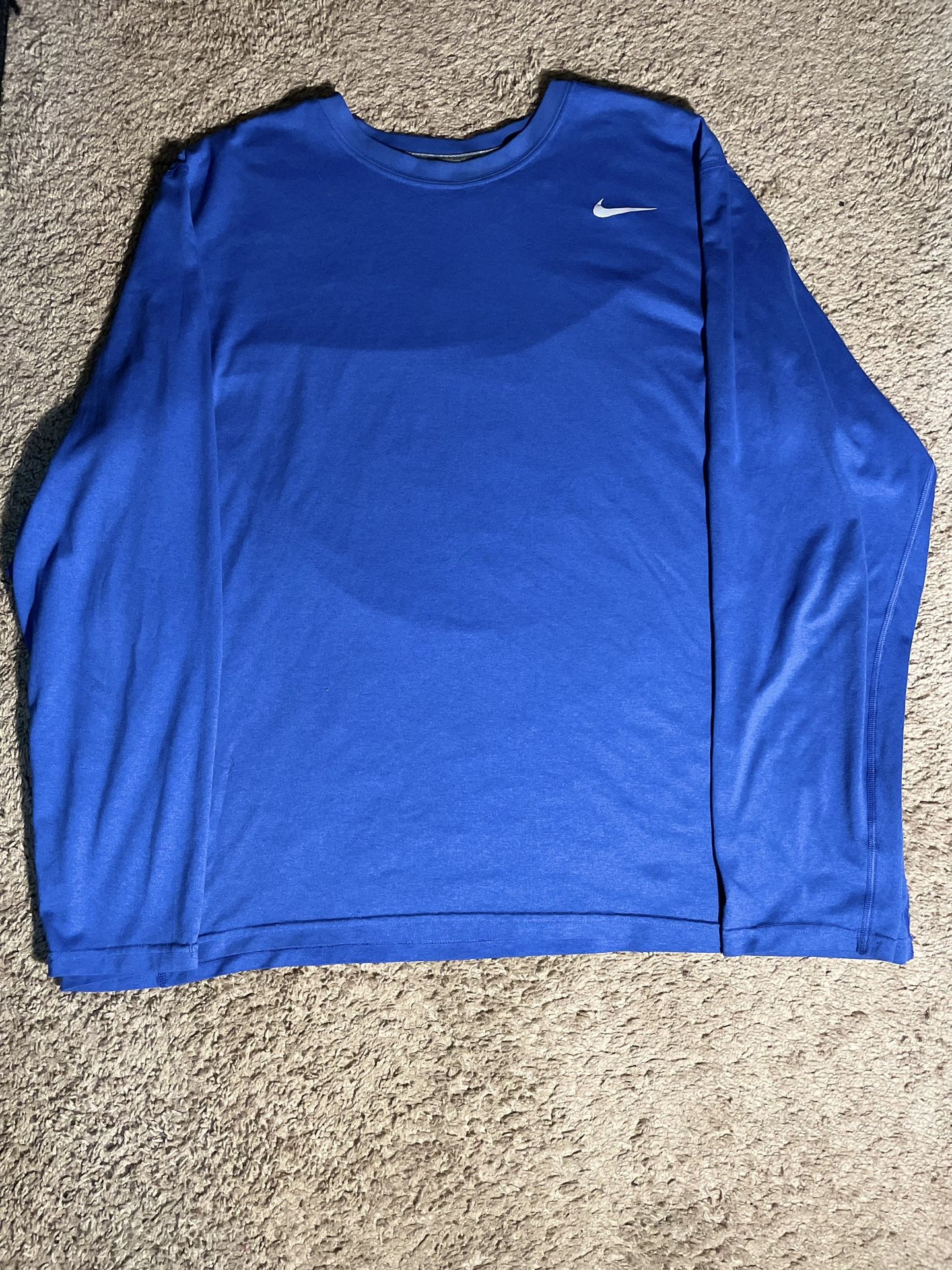 Blue long sleeve Nike shirt