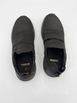 Women’s black non-slip shoes.  Only used once.  Size 10 W
