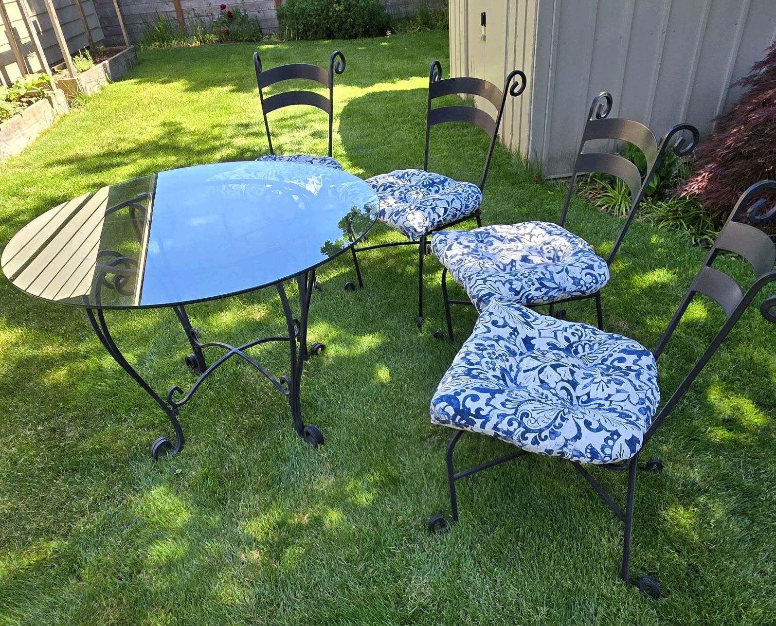 Glass Top Patio Table and Four Chairs 