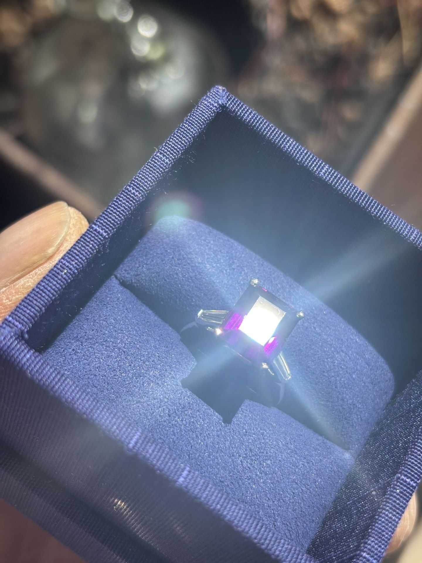 Platinum Band With Emerald Cut Purple Sapphire and Two Qtr Carat Diamond Baguettes
