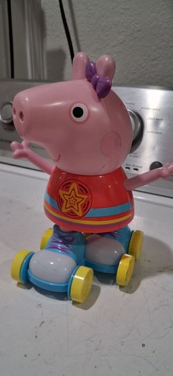 - 11' Hasbro Peppa pig disco rolling skating doll. Good Condition.