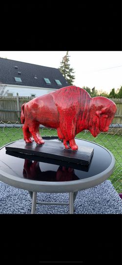 The red buffalo statue