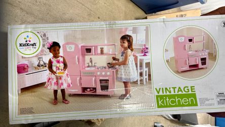Girls  Vintage kitchen.  Includes refrigerator, sink, stove, and shelves