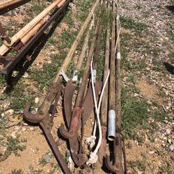 3 12foot Pruner Poles 2 12foot Old Saw Poles