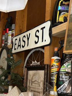 Easy street metal wall sign