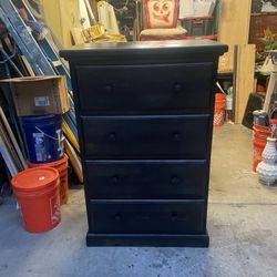 The dimensions are 18 deep 31 1/2 wide and 48 inches tall it’s a black stain four drawer tall boy dress dresser