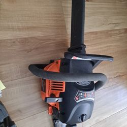 20" Chainsaw And Electric Sharpener