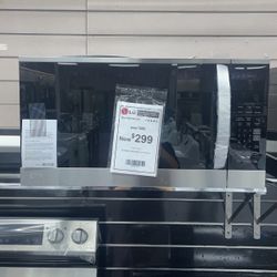 Microwave-LG Brand New Over The Range Microwave 