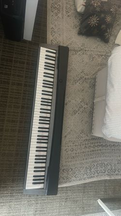 privia weighted piano