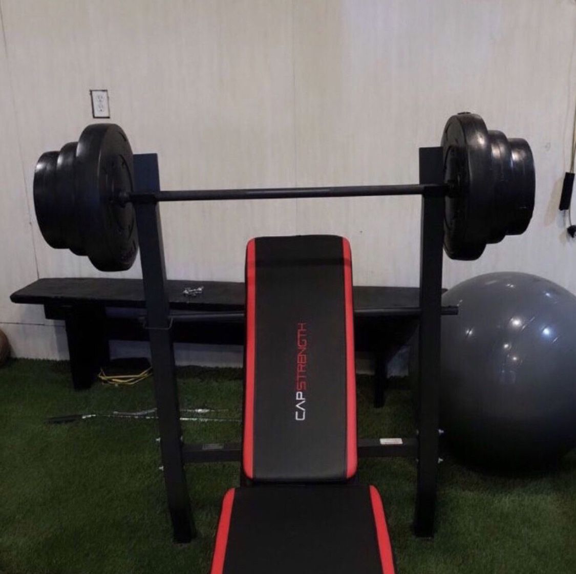 Gym Equipment Adjustable Bench press, barbell, leg developer and 100lbs of weight