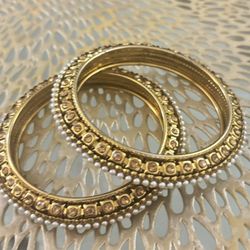 Tradition indian 2 kundan bangles with white pearls all around each bangle size 3.5"