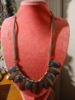 Silver necklace with blue stones
