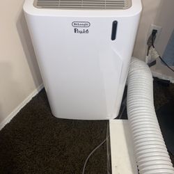 DeLonghi Pinguino Compact Arctic Whisper Portable Air Conditioner, 500 sq. ft.