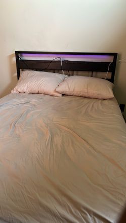 Full-size bed and led headboard