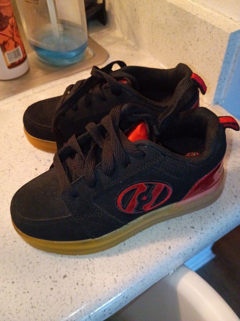 Heelys shoes with a removable wheels