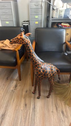 Leather mounted giraffe 38”